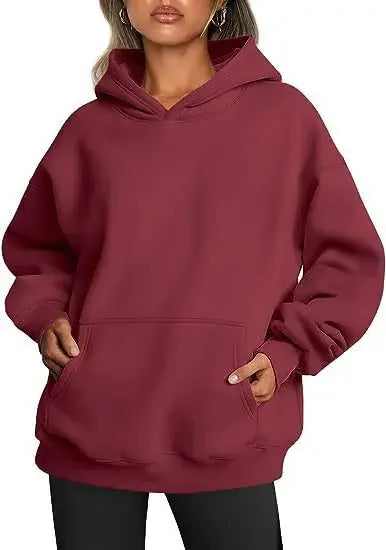 Women’s Hoodies With Pockets Big in burgundy color, showcasing a trendy oversized fit and practical design.