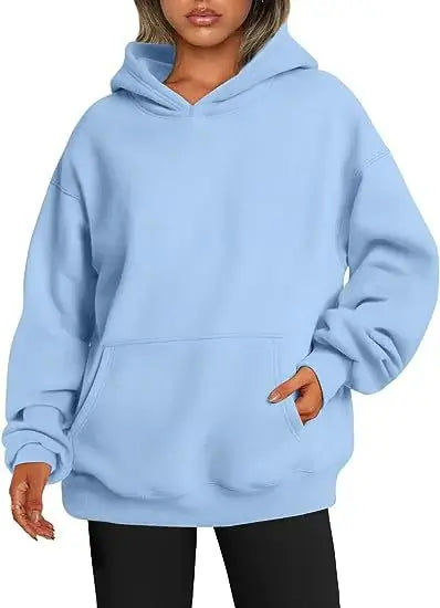 Womens hoodies with pockets big in light blue, featuring an oversized fit and cozy design.