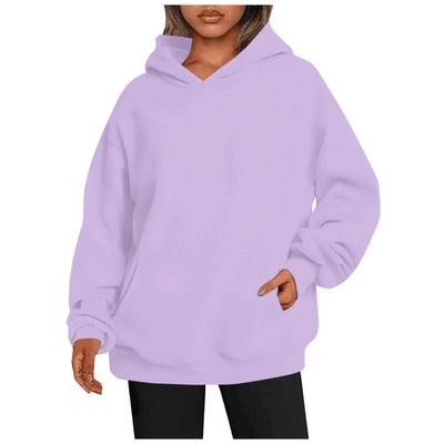 Womens hoodies with pockets big in light purple color, featuring an oversized fit and cozy design.